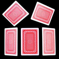 Playing cards for poker game on black background with clipping path.