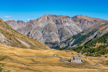 Landscape view of Col de la Cayolle pass and surrounding mountains in France