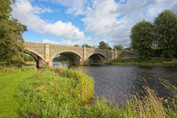 Fototapeta na wymiar Road bridge across the River Tweed in Peebles, Scottish Borders, Scotland, UK.