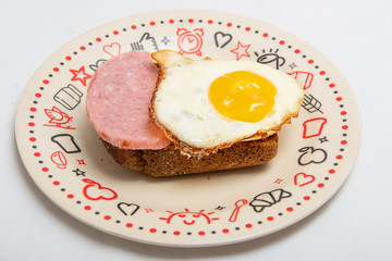 Bacon sandwich and scrambled eggs for a delicious healthy light breakfast. Traditional homemade breakfast food