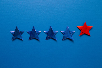 Five stars quality rating on blue background