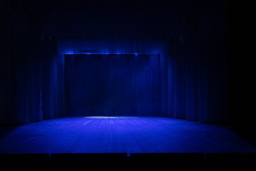 Theatrical scene without actors, scenic light, curtain and smoke