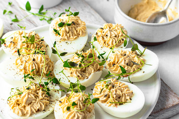 Deviled eggs on a white plate