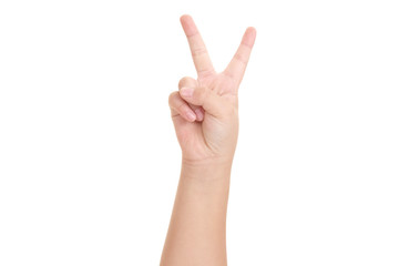 Boy's hand showing the sign of victory and peace close-up isolated on white background.