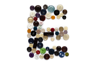 Letter E design made from clothing elements.