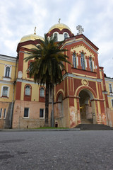 Fototapeta na wymiar Abkhazia, New Athos. View of the monastery with golden domes