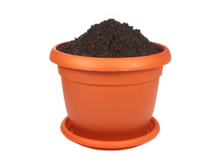 Flower pot with soil isolated on white