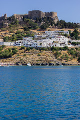 Fototapeta na wymiar Lindos Village on Rhodes, Greece. Panorama made of the sea.