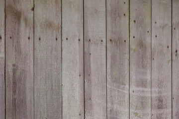Wooden boards on an old fence as an abstract background.