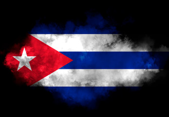 Cuba flag performed from color smoke on the black background. Abstract symbol.