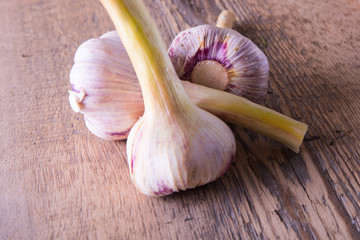 garlic, green, young, on wooden background