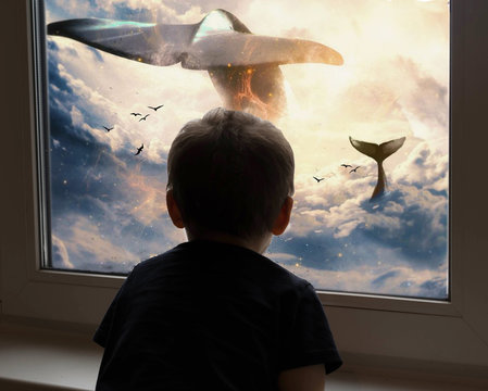 Boy Looking Through Window