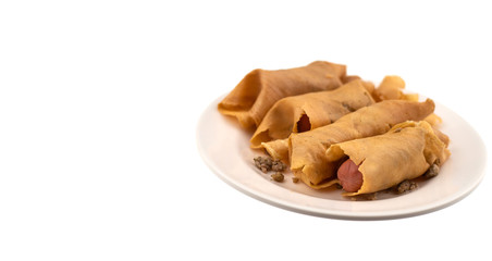 Thai dessert cuisine  Roll pancake stuffed with pork sausage on white background 