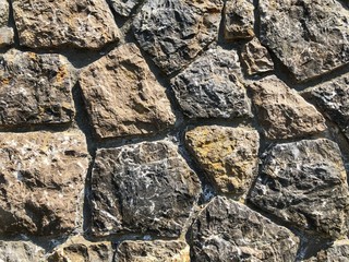 Background texture of a stone wall made of blocks