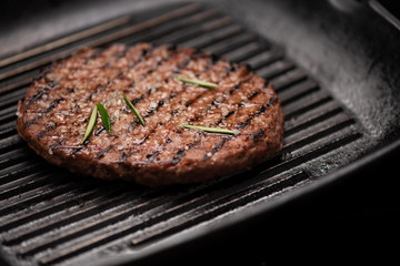 A beef burger grill cooking