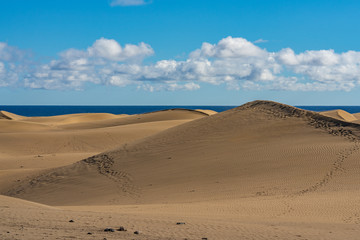 Sea and dunes in Maspalomas on the island of Gran Canaria in Spain
