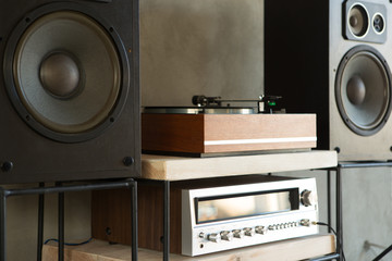 HiFi system with turntable, amplifier and speakers in a studio - obrazy, fototapety, plakaty