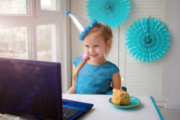 Happy girl  sibling celebrating birthday via internet in quarantine time, self-isolation and family...