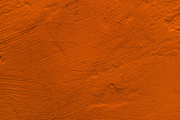 Abstract color background. Empty orange texture with a textured surface.
