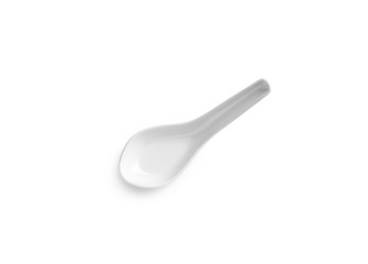white soup spoon on white background