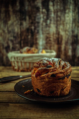 Cupcake muffin sprinkled with powdered sugar rustic