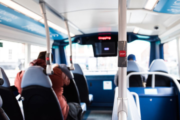 Red stop bell in the city bus. 