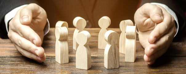 Businessman defending his team with a gesture of protection. Care for employees. Life insurance....