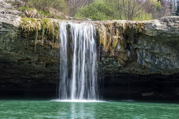 Fototapeta na wymiar Pazincica river and waterfall Zarecki krov in springtime, Istria, Croatia