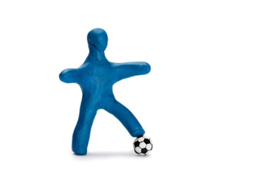 Plasticine small person soccer player with ball