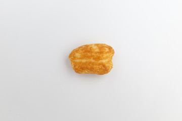 Brown rice cracker on white background