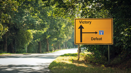 Street Sign Victory versus Defeat