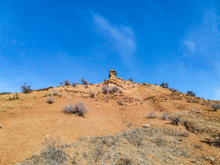 Foothills against the sky with clouds. Mountain landscape.