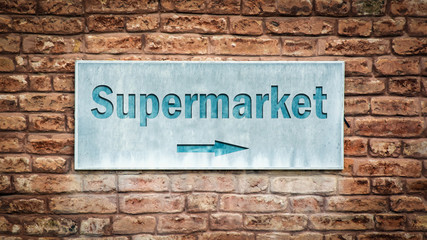 Street Sign to Supermarket