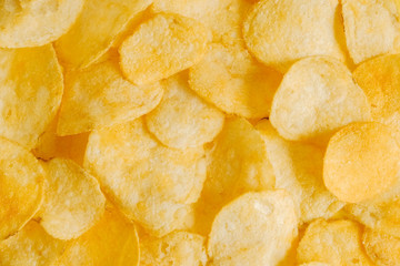 Potato chips snack as background image texture background. Top view. Copy, empty space for text