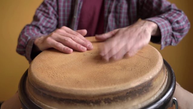 Latin Conga Drums. Hands of percussionist playing Salsa Rhythm