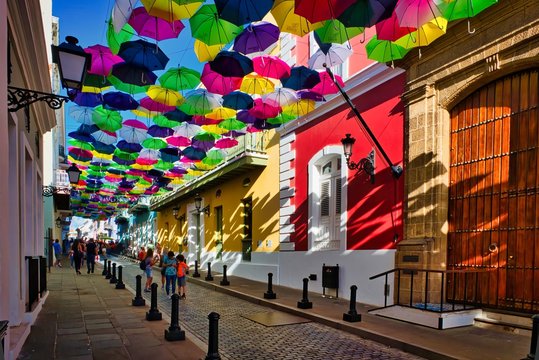 Shoppers stroll through historic Old San Juan. It is the oldest settlement within Puerto Rico and the historic colonial section of the city of San Juan.