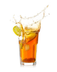 Glass of tasty cold ice tea with splash on white background