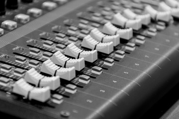 Obraz premium Close up button control mixer audio (black and white color)