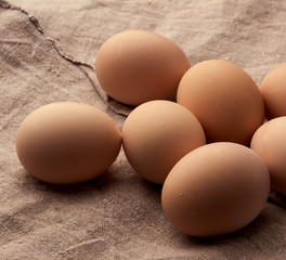 whole broken raw brown homemade chicken eggs