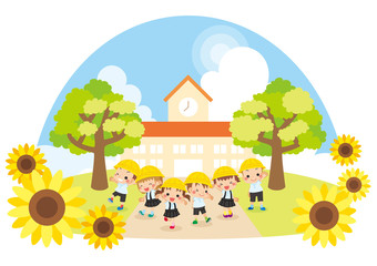 Obraz na płótnie Canvas 晴れた夏の日に幼稚園の前で微笑む元気一杯の幼稚園児