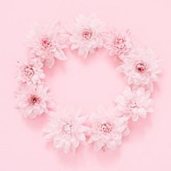 Beautiful flowers composition. Pink flowers on pastel pink background. Soft floral background. Flat lay, top view, copy space, square