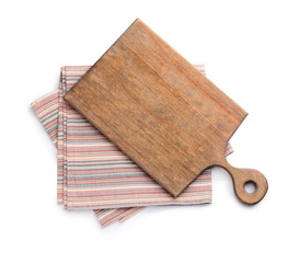 Clean napkins with cutting board on white background