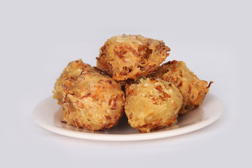 Traditional Indonesian Vegetable Fritters Snack called “Bakwan” or “Gorengan”