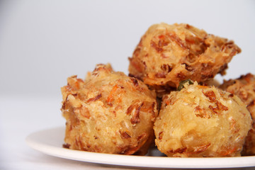 Traditional Indonesian Vegetable Fritters Snack called “Bakwan” or “Gorengan”