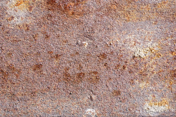 Oxidized metal surface, rust on iron surface, abstract rusty metal panel texture background.