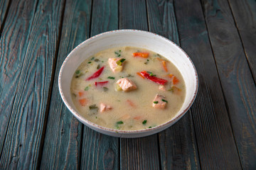 Delicious hearty cream soup with smoked salmon
