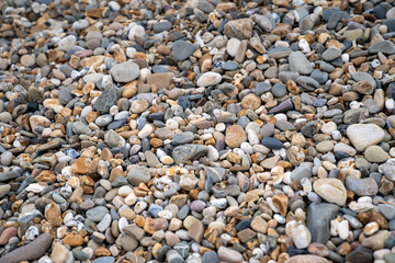 A close up of a rock and pebbles