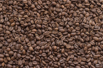 Roasted brown coffee beans background texture