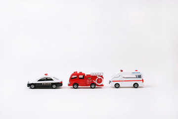 Small Fire truck, Ambulance and Police Car on White Background, The Dream Career of a Child, Fireman, Doctor and Policeman                               