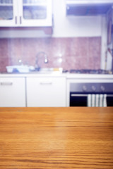 Blurred kitchen interior with desk space